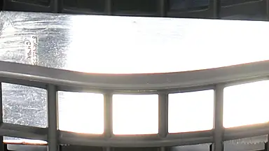 KitchenAid KDTE404DSS with a knife
