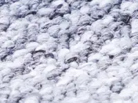 Man cleaning blue carpet
