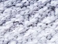 Man cleaning blue carpet