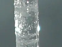 Icicles dripping from a freezer tray