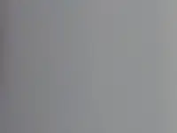 A woman uses Siri to control her Philips Hue lights