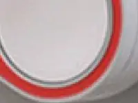 A Tide detergent Amazon Dash button on a washer