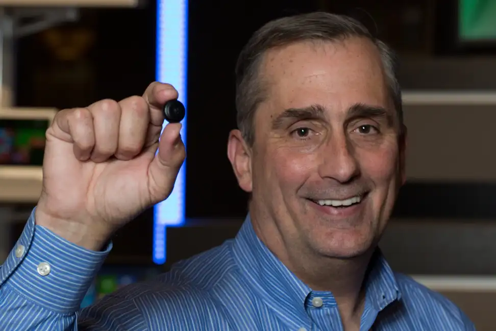 Intel CEO Brain Krzanich holding the Intel Curie