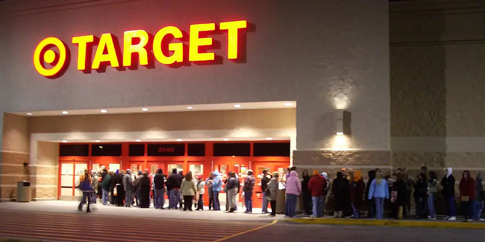 Customers line up outside a Target store on Black Friday