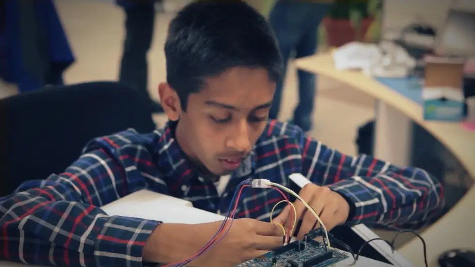 Young inventor builds a microwave that can perfectly heat your food.