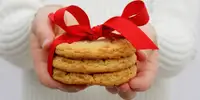hands holding cookies