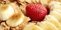Strawberries and banana on cereal