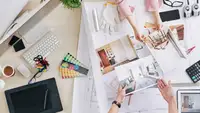 Two people deciding on new interior decorating designs.