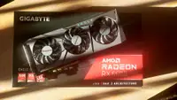 A PC graphics card laying on top of a box
