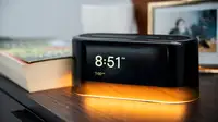 The Loftie Alarm clock gently illuminates a nightstand