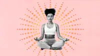 A woman practicing yoga in lotus pose.