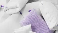 A heap of the brand Purple's pillows