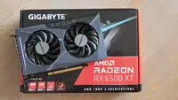 A desktop graphics card sitting on top of its box