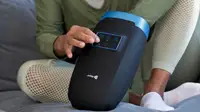 Close-up photo of a model enjoying the LifePro Hand Massager.