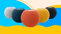 Apple HomePod minis in white, navy, peach, yellow, and black.