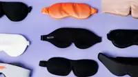 A collection of sleep masks against a purple background