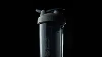 Close-up of a black BlenderBottle shaker bottle.