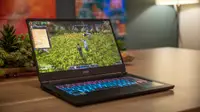 An open and powered on laptop showing a video game.