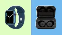 Navy blue smart apple watch next to black ear buds.