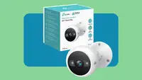 A display of the Kasa Camera and the retail box in front of a background.