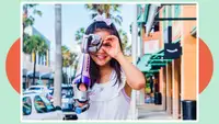 A young girl wears a bionic arm from Limbitless Solutions.