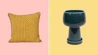 A yellow throw pillow against a pink background and a blue ceramic planter pot against a yellow background