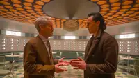 An image from the series 'Loki' featuring Tom Hiddleston as Loki and Owen Wilson as Mobius.