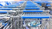 Shopping carts with blue handles