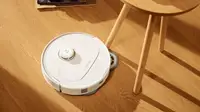 The Roborock S8 MaxV Ultra cleaning around a table