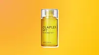 Olaplex hair oil against an orange and yellow background.
