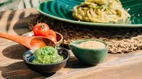 Sauce ingredients spread out on a table.