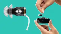 A single left Eargo SE hearing aid next to person holding since Eargo SE hearing aid above its charging case.