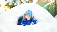 A child in an igloo