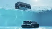 Aiper experts duo robotic pool cleaning on the surface and floor of an inground pool