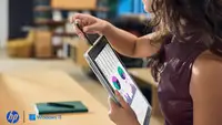 Woman holding a folded HP EliteBook X Flip with an HP Windows 11 logo in the corner