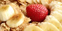 Strawberries and banana on cereal