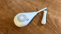 Daysy fertility monitor with red (fertile) light illuminated