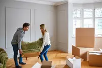 Two people moving in and renovating their home.