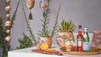 Trays, rain chains, and potted plants are great outdoor bar ideas