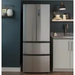 A close-up of a French-door refrigerator installed in a modern kitchen.
