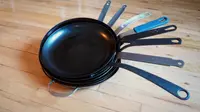 A stack of the best carbon steel pans Reviewed tested from Mauviel, BK Cookware, Blanc Creative, Matfer Bourgeat, De Buyer Mineral B, and more.
