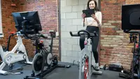 woman sitting on exercise bikes