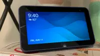 Amazon's Echo Show 5 (second-gen) smart display sits on a bookshelf.