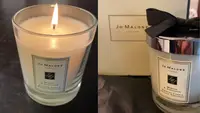 On left, Jo Malone Mimosa and Cardamom Home Candle burning. On right, Jo Malone Mimosa and Cardamom Home Candle in original packaging.