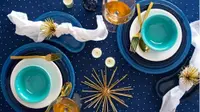 Blue, white, and turquoise Fiestaware place settings.