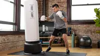Man using Fight Camp at home.