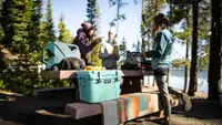 people camping with yeti cooler
