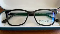 Close up of Felix Gray blue light glasses in a case.