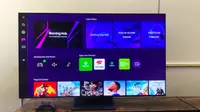 A 55-inch Samsung S95B OLED TV displaying the home screen of Samsung's Gaming Hub platform