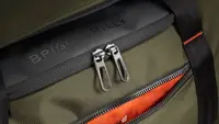 Close-up of the hunter green Briggs & Riley ZDX large duffel bag
